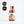 Load image into Gallery viewer, In the centre of the page is a single-serve cocktail in a cute looking small glass bottle, with a black aluminium cap. To the left of the page are some award logos from the Great Taste awards; one star in 2023 and a logo for a Great Taste producer. The cocktail is an Aperol Negroni and the label is orange and white. In the centre is a circle and a picture which looks like David Bowie as Ziggy Stardust in the centre, with a blue background. The cocktail is a deep orange/red colour.
